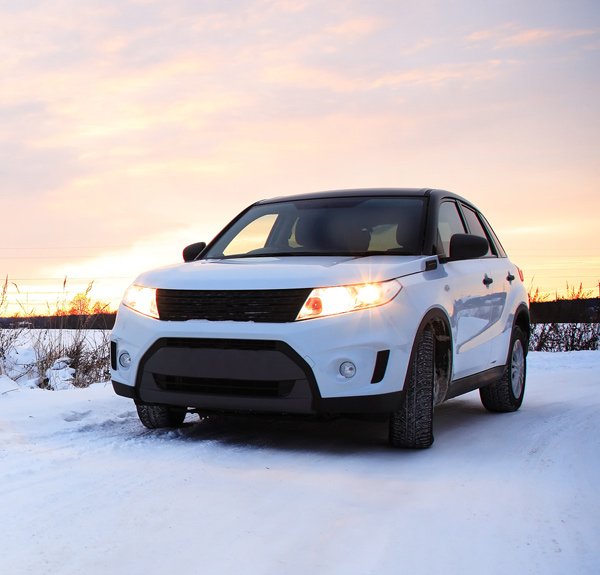 White SUV in the snow